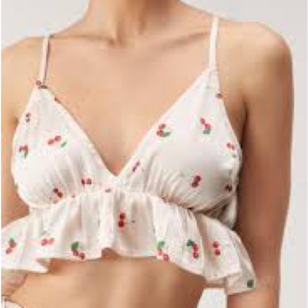 White Sleeveless Top with Red Accents